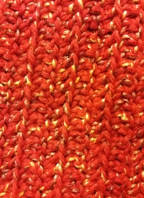 Close-up of pattern stitch showing front-loop-only double crochet stitch.