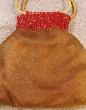 Inside-out bag showing the bronze-colored organza lining.